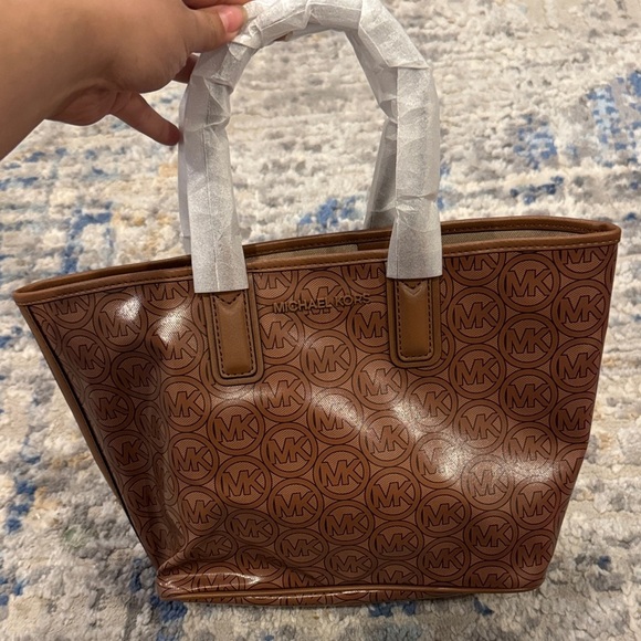 Michael Kors Handbags - Michael Kors Tan Jodie small MK Logo Jacquard Tote in Luggage Style